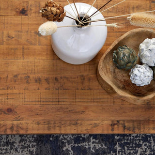 top down view of ceramic jar and wood bowl