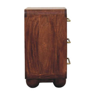 Side view of the dark wood chest showing the vertical grain, rounded top, and three protruding brass handles.