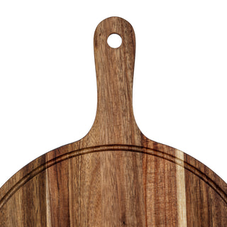 Close-up of the acacia serving board handle, hanging hole, and the circular groove detail.