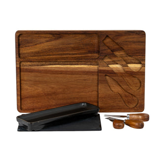Acacia cheese board with recessed sections, shown with the slate, ceramic dish, and three wooden-handled cutlery pieces.