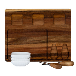 Front view of the acacia cheese board showing recessed sections for bowls and cutlery, with components resting below.