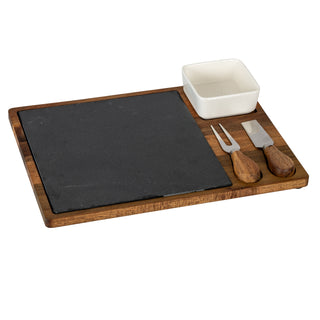Acacia cheese board set with slate insert, white ceramic bowl, and two wooden-handled cheese tools.