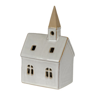 White ceramic church ornament with glossy glaze and rough tan edging along the roofline and base.