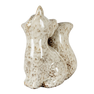 Ceramic fox decoration viewed from the back, highlighting the speckled glaze and upright pointed ears.