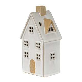 White glossy ceramic townhouse decoration with multiple cut-out windows and a beige chimney and dormer roof.