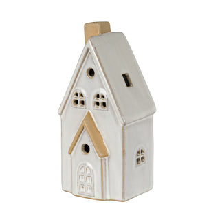 White glazed ceramic townhouse decoration with tan accents, featuring cut-out windows and a chimney. 3/4 view.