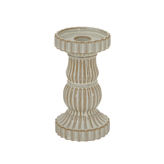 Cream ceramic pillar candle holder with vertical fluted texture and distressed tan detailing.