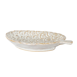 Horizontal view of the ceramic pinecone dish, showing the shallow depth and textured, cream interior.