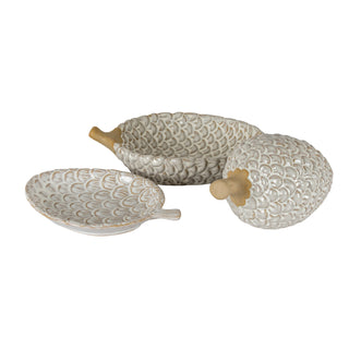 Two ceramic pinecone dishes displayed together, one lying flat and one standing upright.