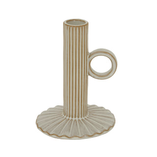 Beige ceramic taper candle holder with vertical ridges, a scalloped base, and a circular side handle.