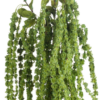 Detail of the clustered, hanging artificial green amaranthus stems and tiny leaves.