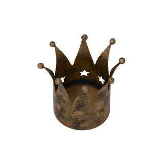Angled shot looking down into the antique gold crown tealight holder, highlighting the star cutouts and distressed finish.
