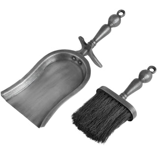 Angled view of the antique pewter effect dustpan and brush set against a plain white background.
