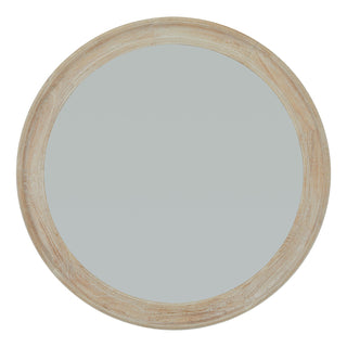 Large round mirror with an antique whitewashed wood frame.