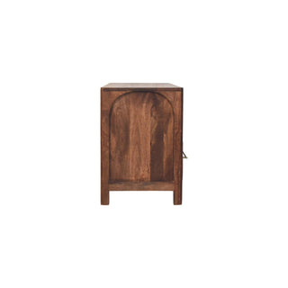 Full side profile of the dark wood media console showing the arched recessed panel detail.