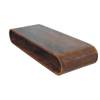Dark wood arc media console viewed from above, showing the continuous curved design and deep colour.