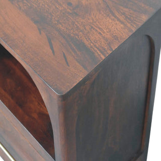 Close-up showing the smooth, rounded top edge and the dark wood grain texture of the bedside table.