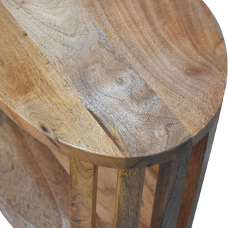 Close-up showing the construction joint between the wooden tabletop and the vertical slatted sides.