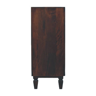 Side profile of the dark wood chest showing its depth and turned wooden feet.