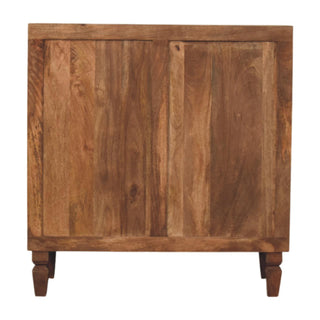 Full rear view of the teak chest showing the vertical wood panel construction and turned feet.