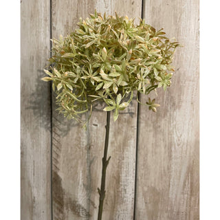 Single artificial allium stem with a variegated green and beige flower head, photographed against rustic wooden boards.