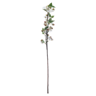 Full length view of the artificial blossom branch with white flowers, green leaves, and long dark stem.