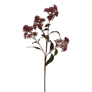 Plain studio shot of a single artificial stem featuring dark burgundy foliage and clusters of small maroon flowers.