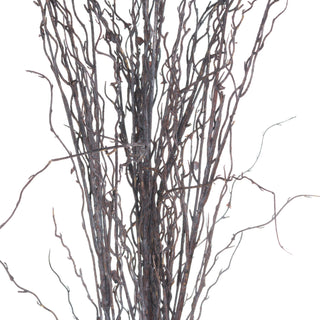 Tight close-up detail of the dense cluster of dark, winding artificial branches.