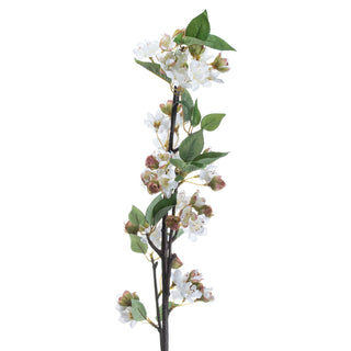 Isolated artificial blossom branch showing white flowers, pink buds, and dark green leaves on a dark stem.