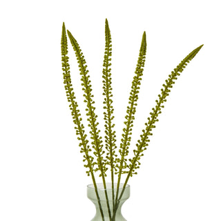 Five artificial green eremurus stems arranged in a grey glass vase against a white background.