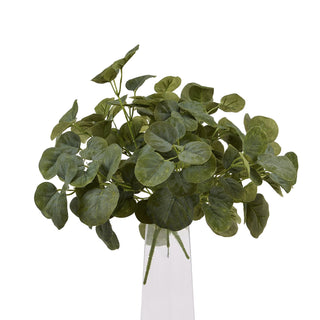 Full artificial eucalyptus bunch in a clear vase on a white background.