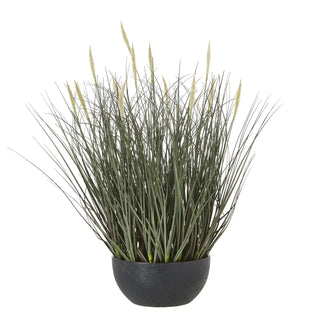 Artificial fountain grass plant with long green blades and light beige seed spikes in a textured dark grey pot.