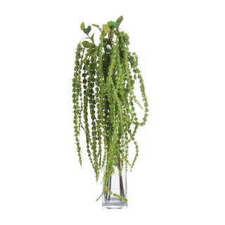 Artificial green amaranthus stem displayed in a clear rectangular glass vase against a white background.