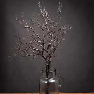 Faux large branch spray with fine dark branches and silvery texture, shown in a clear glass jug against a charcoal background.