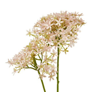 Detailed view of the cluster of pale pink artificial hydrangea florets on a white background.