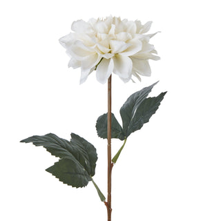 Side view of the artificial white dahlia flower head, stem, and textured dark green leaves.