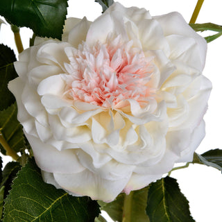 Close-up detail of the artificial white rose bloom with ruffled petals and a pale pink centre.