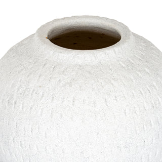 Close-up detail of the vase opening, showing the rough, textured surface and granular finish around the rim.