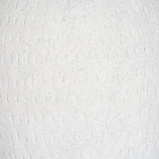 Detail of the vase surface, highlighting the speckled white finish and faint, repeating indented lines.