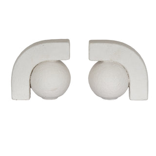 Pair of ashen white ceramic bookends, each featuring a textured sphere held within a geometric arched bracket.