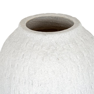 Close detail of the vase opening, showing the thick, speckled white ceramic texture and dark interior.