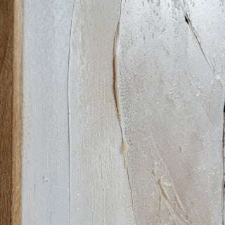 Detail of the canvas weave, thick impasto paint texture, and the grain of the adjacent wooden frame.