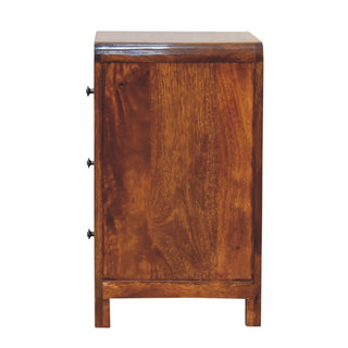 Profile view of the three drawer bedside table, highlighting the smooth curved top edge and side panel grain.