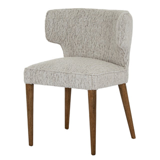 Dining chair upholstered in textured light fabric with curved backrest and four tapered wooden legs.