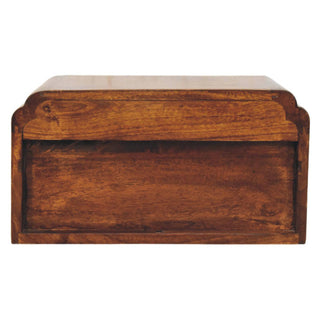 Flat front view of the chestnut bedside unit, showing the open shelf compartment above the solid drawer face.