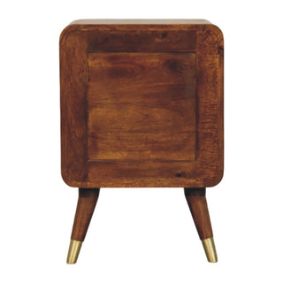 Rear view of the chestnut nightstand showing the solid wood back panel and tapered legs with brass tips.