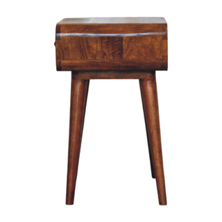 Profile view of the chestnut nightstand showing the rounded body and tapered legs.