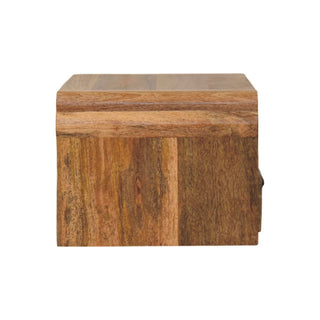 Profile view of the wooden bedside unit, highlighting the depth and the decorative curved moulding.