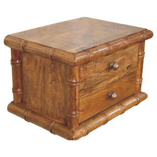 Amber oak bedside unit viewed from above, highlighting the continuous bamboo-effect frame around the top and base.
