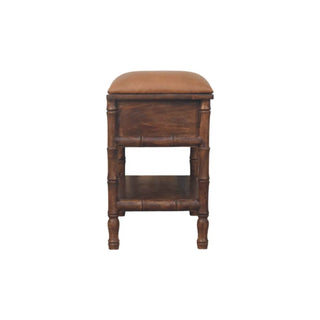 Isolated view of the dark wood storage unit with tan cushion and lower shelf.